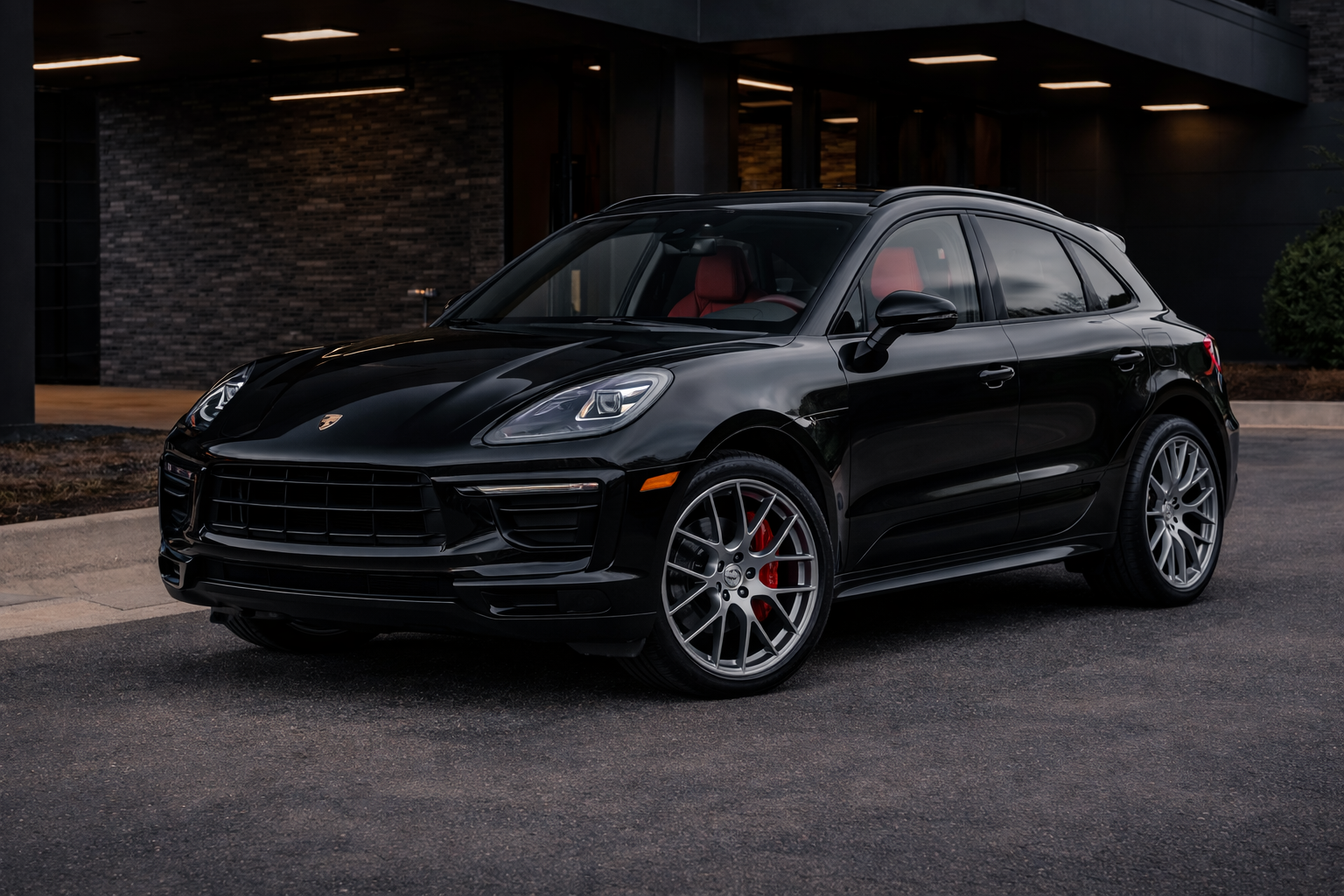 2025 Porsche Macan (Black / Red Interior) available for rental in Dallas–Fort Worth (DFW)